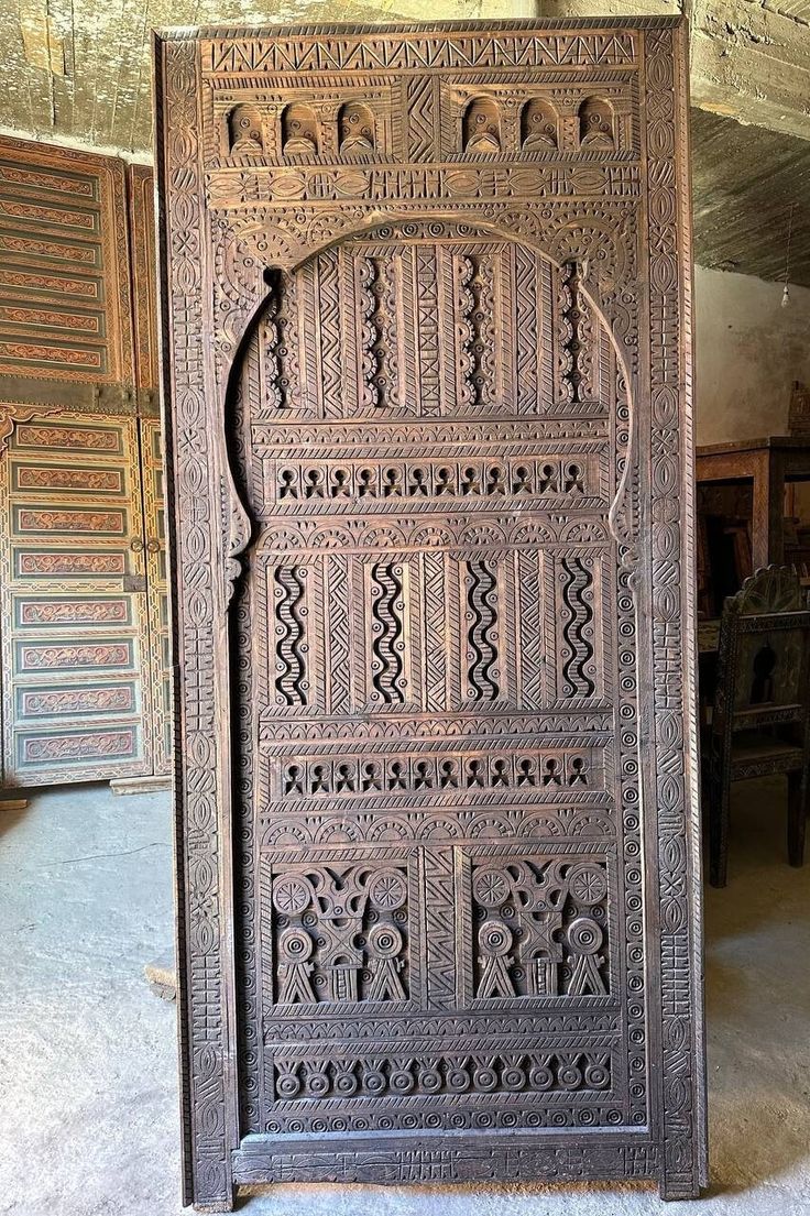 Detail of hand-carved geometric wood pattern